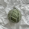Handmade glass Christmas ball pendant ornament, 8cm diameter, green color, on tree branch