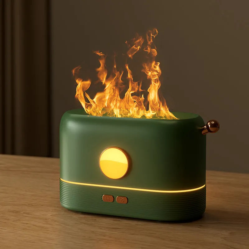 Black USB humidifier with simulated flame effect and water tank on wooden desktop
