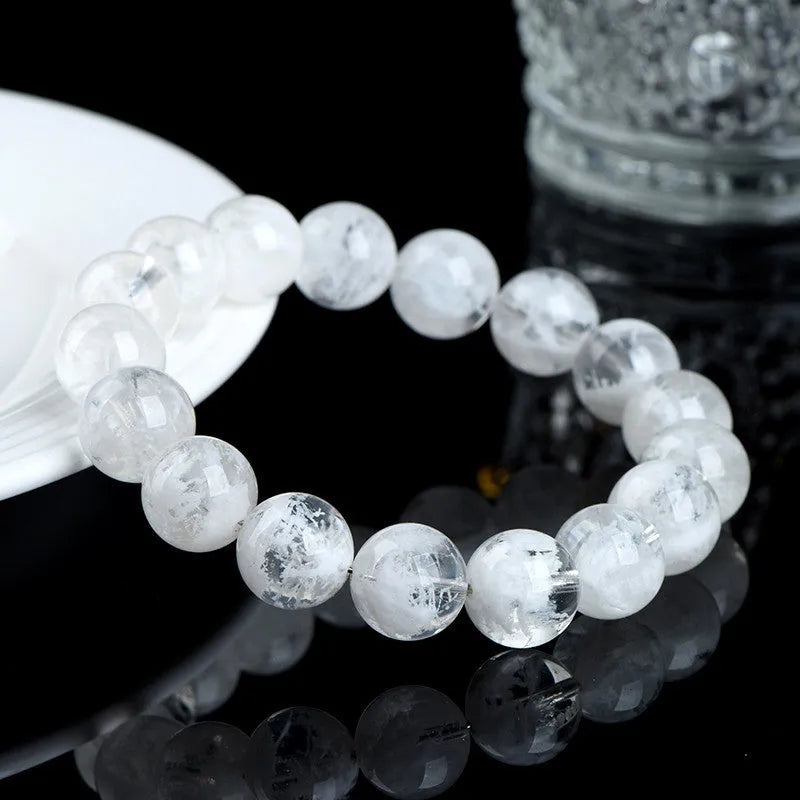 Women's crystal bracelet with blizzard snowflake round beads featuring ruyi and xiangyun design elements.