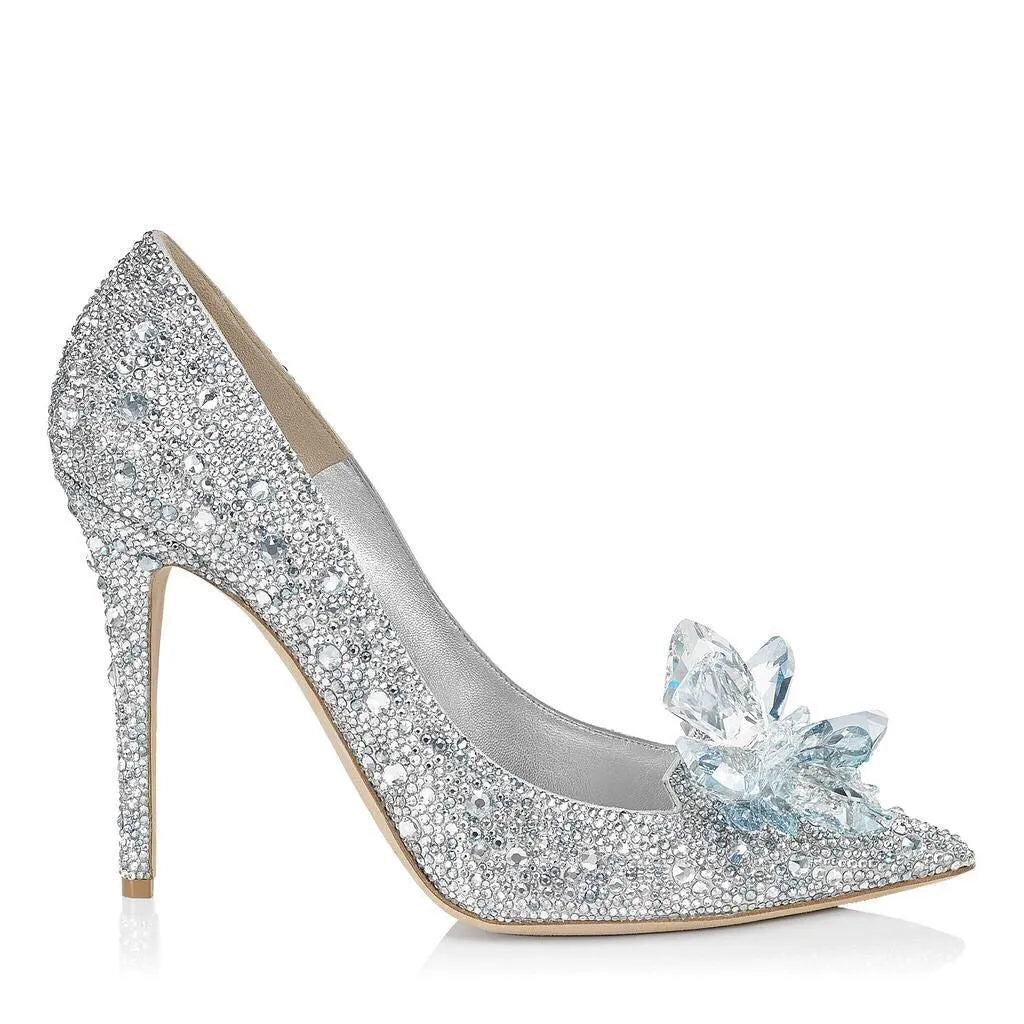 Women's gold high heels with pointed toe, rhinestone decoration, and stiletto heel