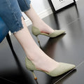Women's black PU leather pointed toe stiletto high heels on a light background