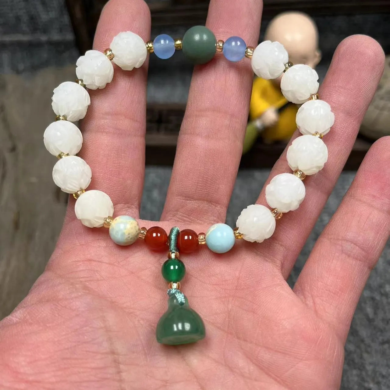 Carved pumpkin lotus Bodhi root bracelet with white jade beads and multiple dimensions