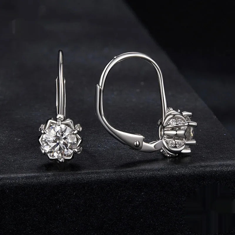 Sterling silver flower bud ear clips with moissanite stone and white gold plating