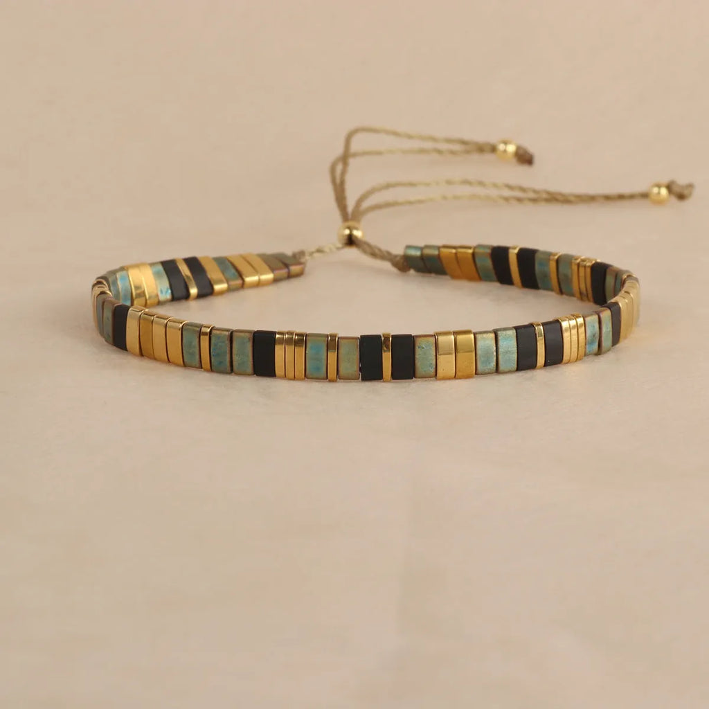 Adjustable glass beaded bracelet in geometric design with round beads available in five colours
