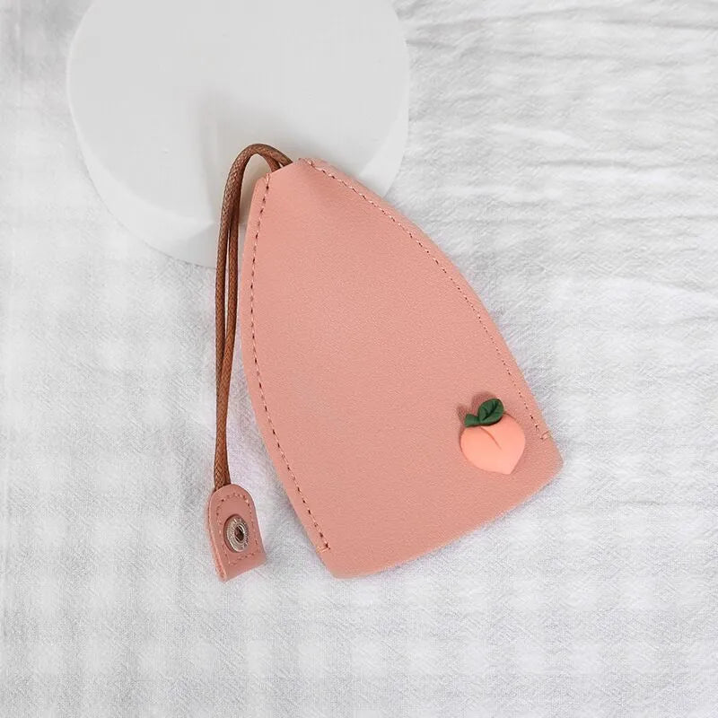 Cartoon style pull-out car key case made from PU leather in assorted designs