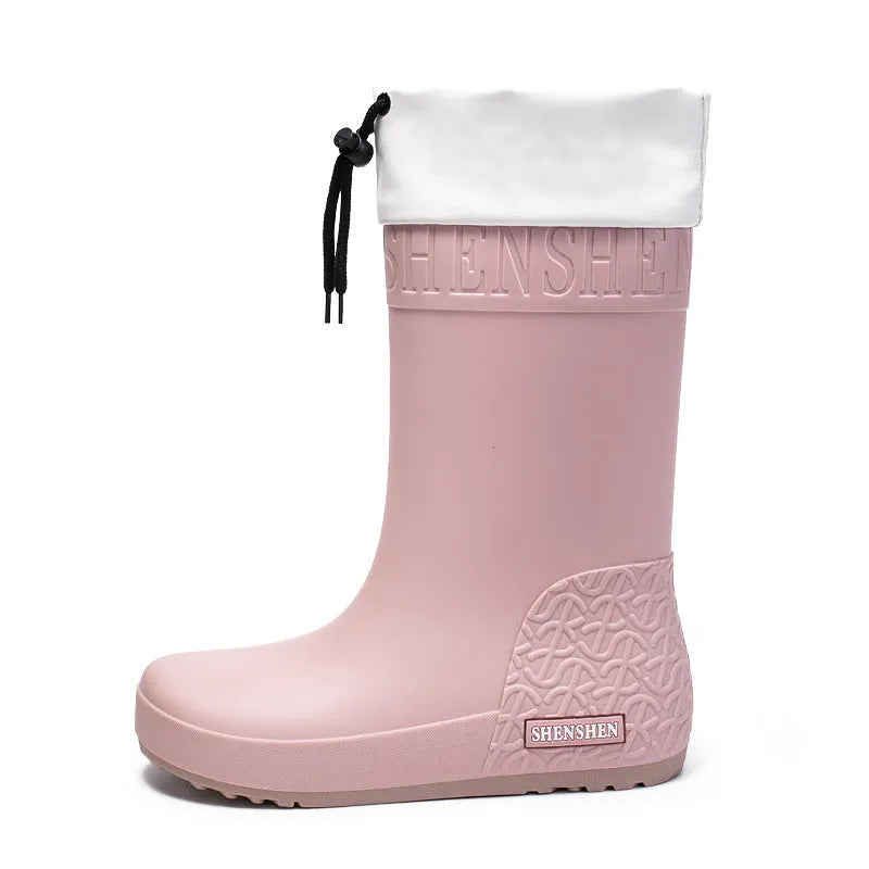 Women's solid colour PVC rain boot in apricot, featuring a non-slip sole and waterproof mouth design.