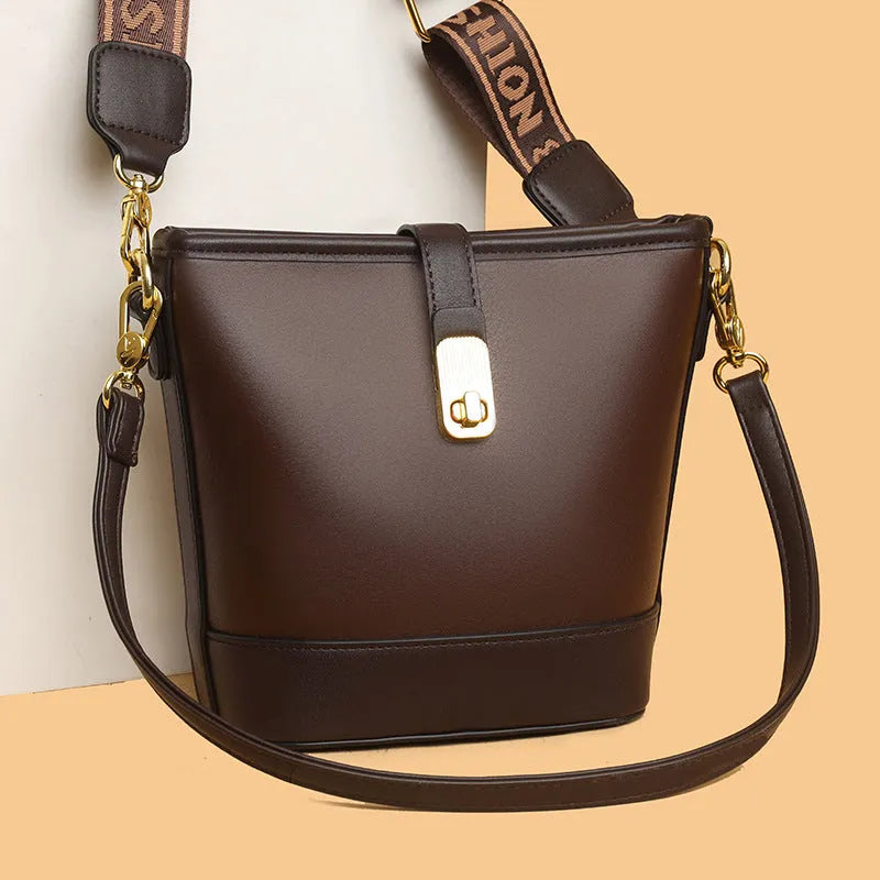 Korean style black PU bucket messenger bag with organised interior compartments and double shoulder straps