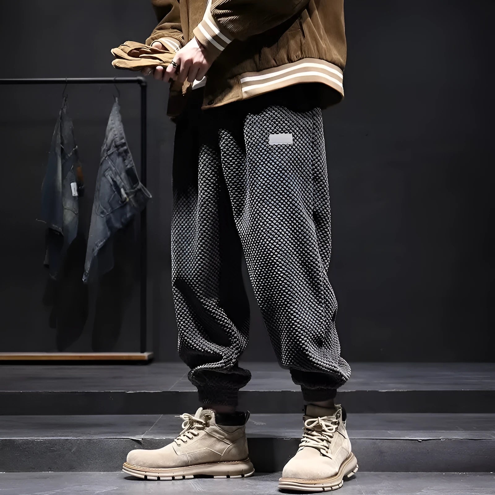 Men's grey ankle-tied sweatpants with a straight leg and non-ironing fabric.