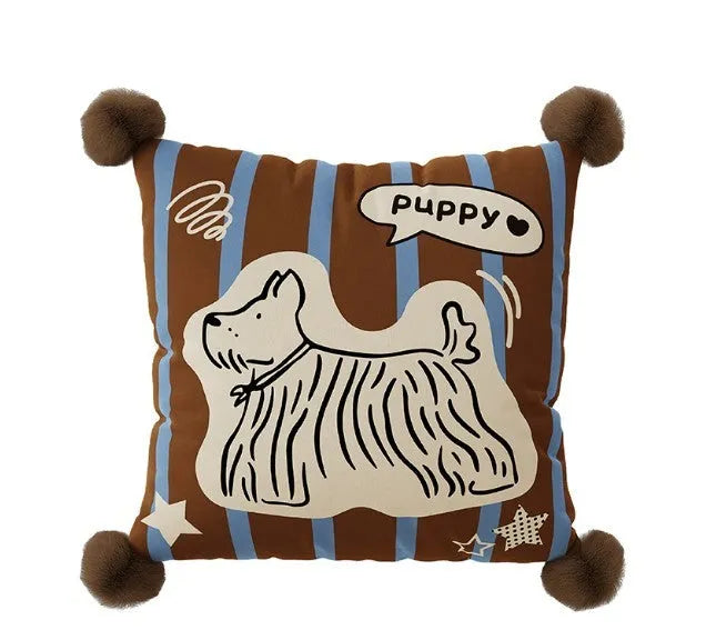 Blue cartoon animal print cushion pillow with removable cover on a grey sofa.
