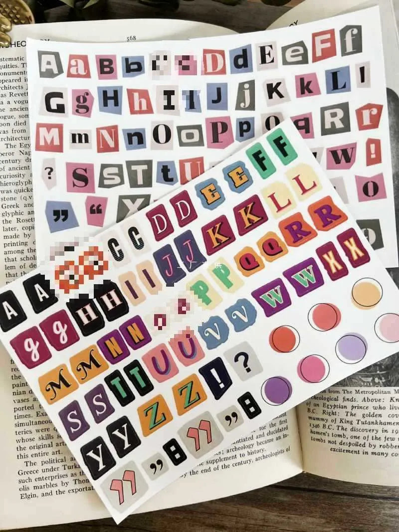 Set of cute style printed stickers featuring English letters, numbers, symbols, and weekday words for decoration and labelling.