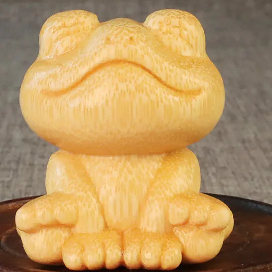Solid bamboo smiling frog carving ornament measuring 5cm height with 4.5cm diameter