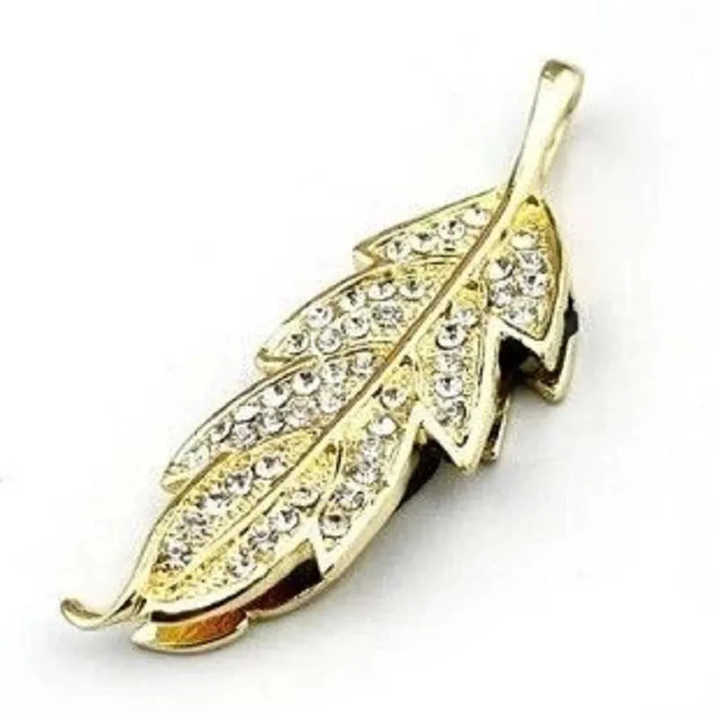Silver metal USB flash drive with crystal leaf jewellery design on a white background.
