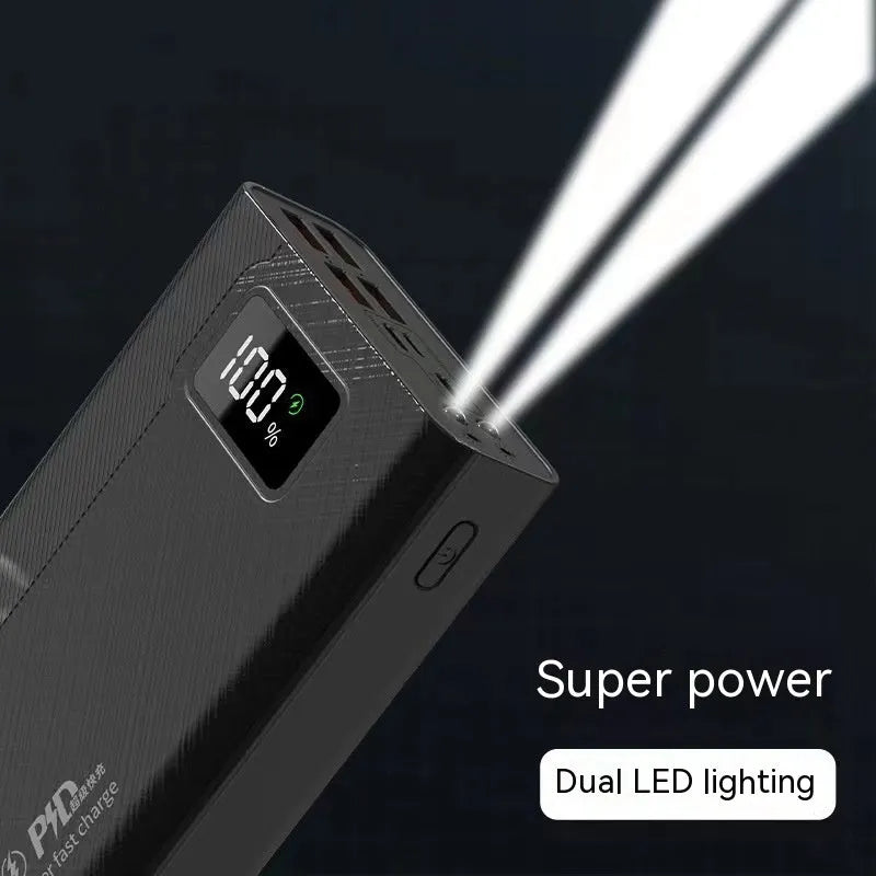 Black and white large capacity power bank with fast charging support measuring 150mm x 76mm