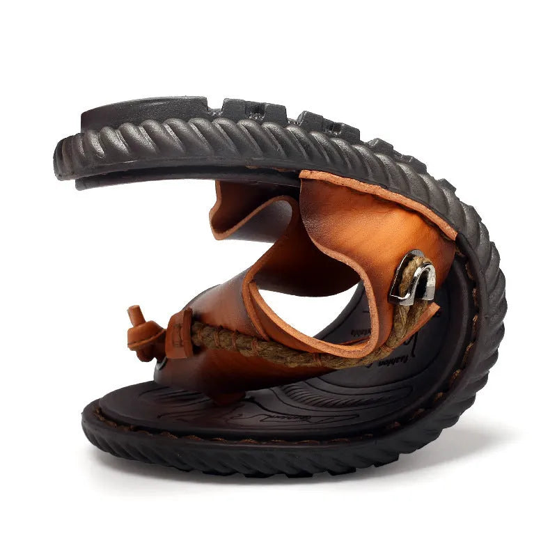Men's dark blue herringbone outdoor slippers with a rubber sole, shown in a large size.