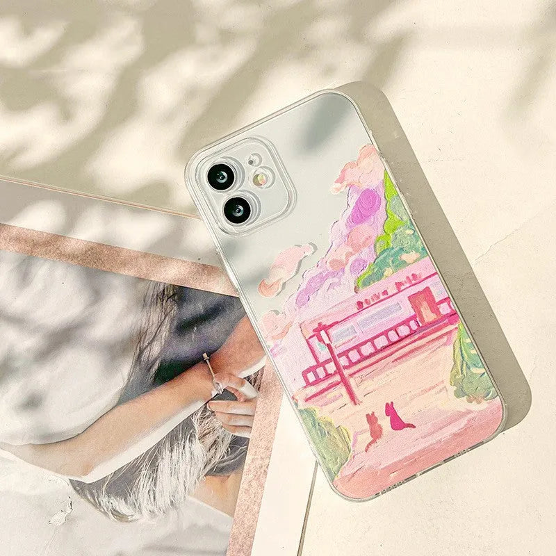 Soft silicone mobile phone case with a colourful two cat cartoon design on the back for Apple iPhone.