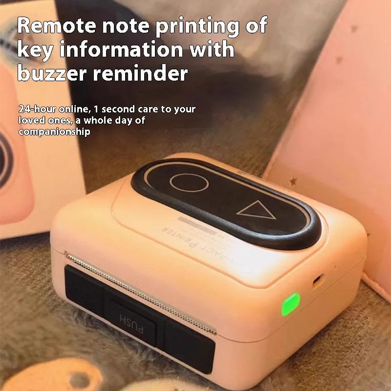 Compact Avocado Green Bluetooth mini thermal printer on a desk next to a mobile phone.