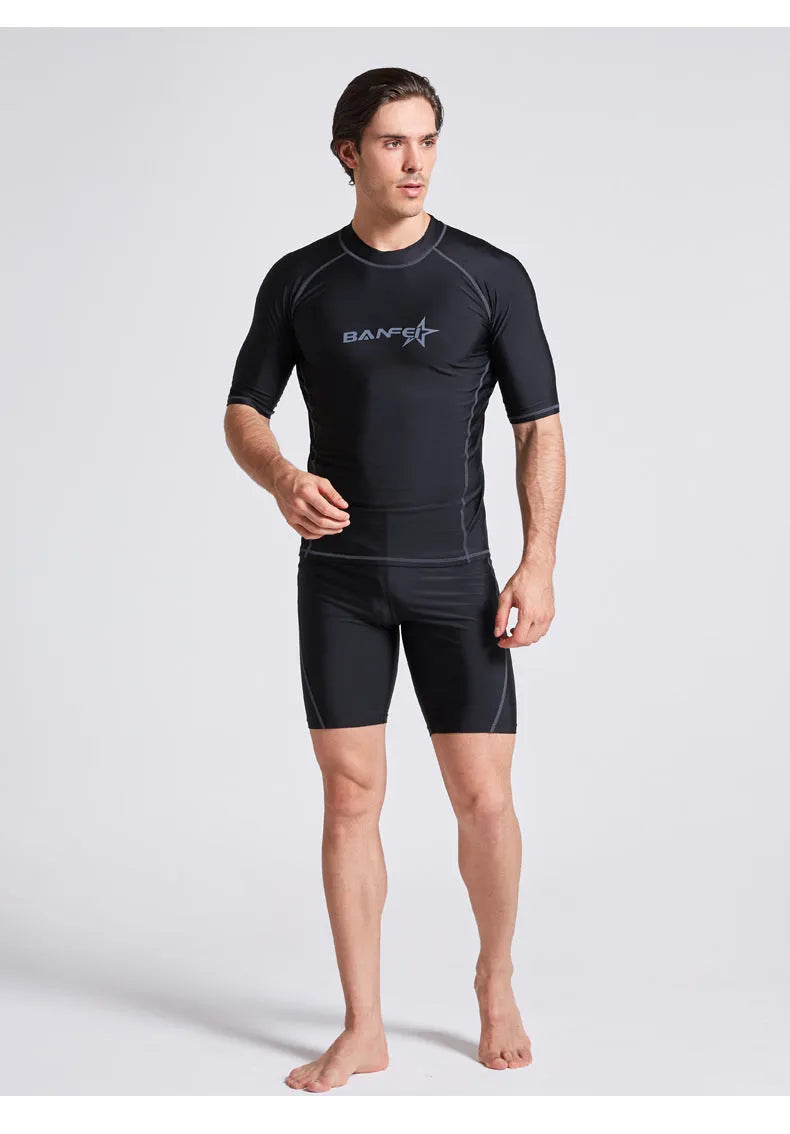Men's blue quick-drying half sleeve nylon swimsuit set with swim top and pants for snorkelling