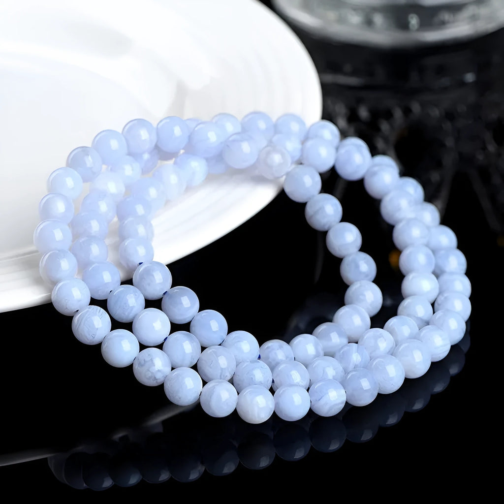 Blue agate bracelet with multi-circle stripe pattern and 6-6.8mm beads
