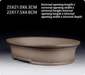 Handmade purple sand ceramic antique oval bonsai flower pot measuring 25x21x6.3cm