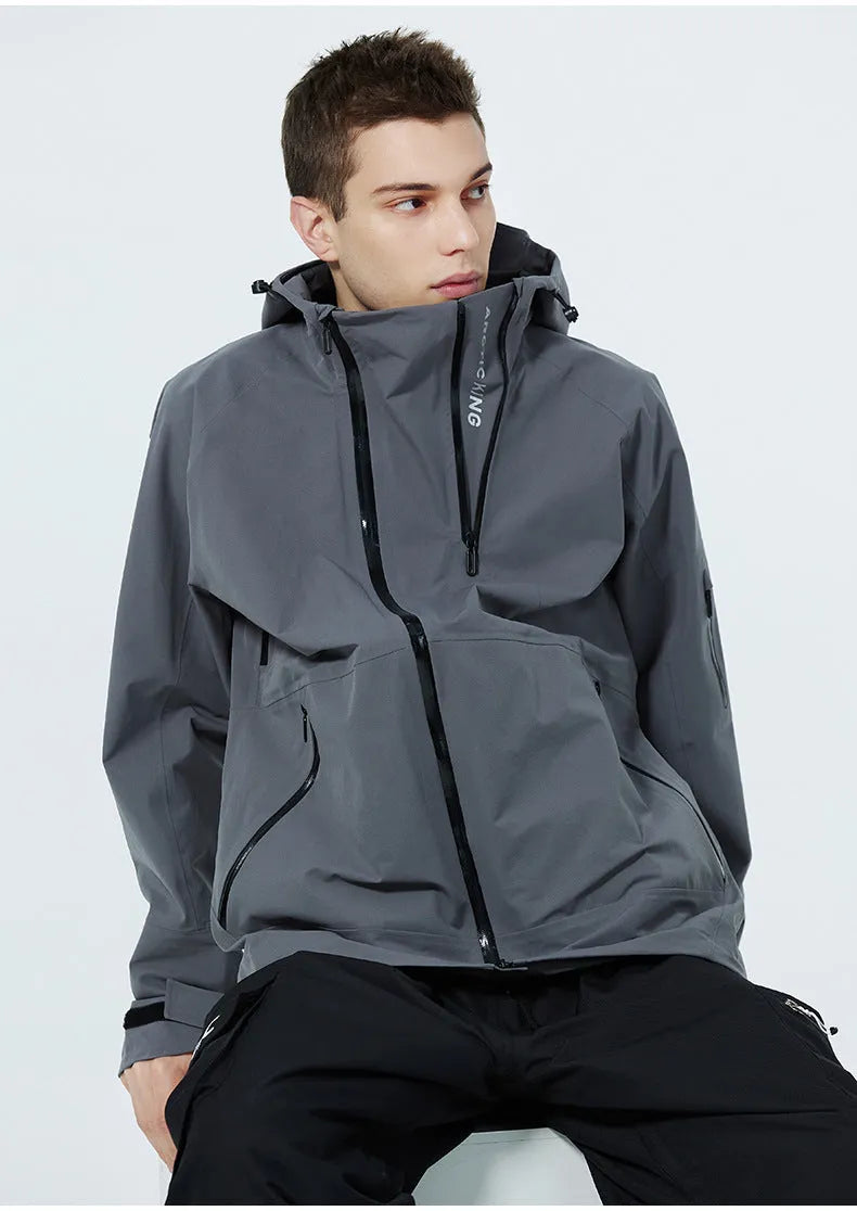 A unisex thin ski suit in yellow, shown on a model, designed for windproof and waterproof winter sports.