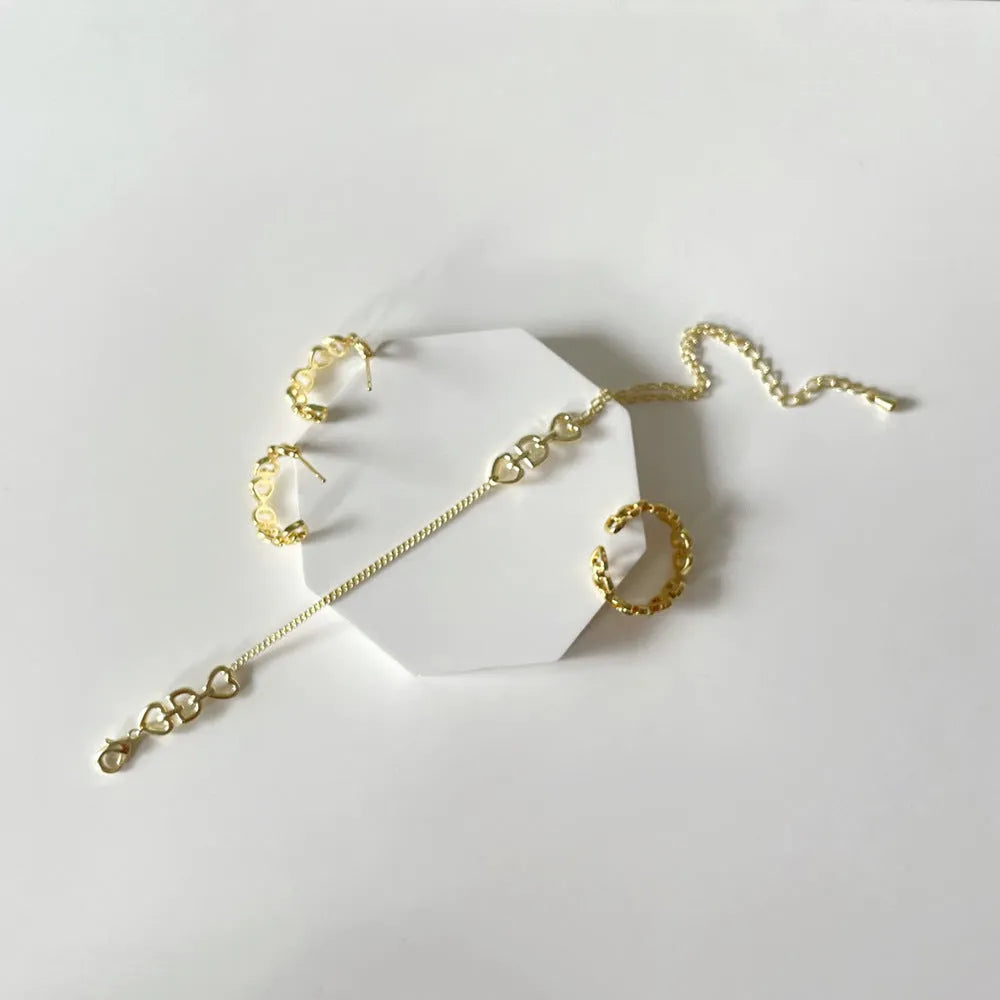 Gold-plated geometric copper Love Letter D earrings ring and bracelet set with inlaid artificial gems