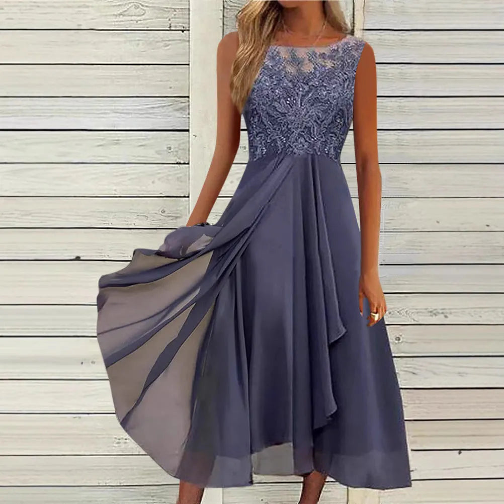 Women's sleeveless green chiffon dress with lace hollow-out detail and a mid-length flared skirt.