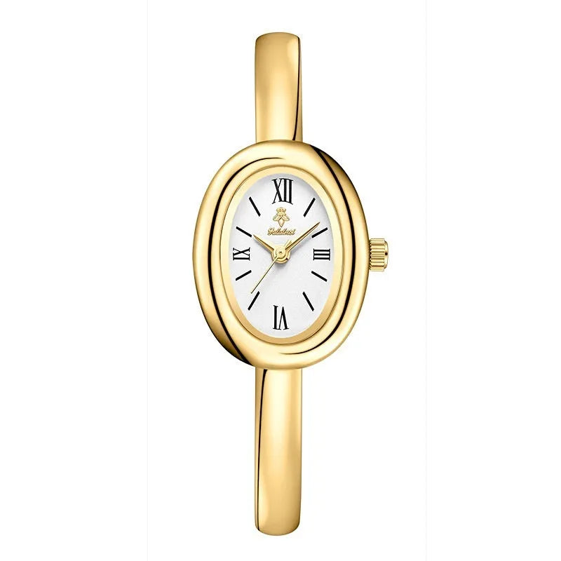 Women's oval retro quartz watch in gold colour with spiral pattern on 8mm slim case