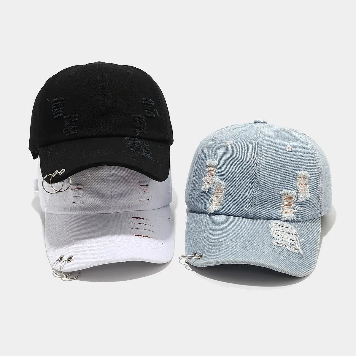 Men's black denim peaked cap with adjustable strap and dome crown on a plain background.