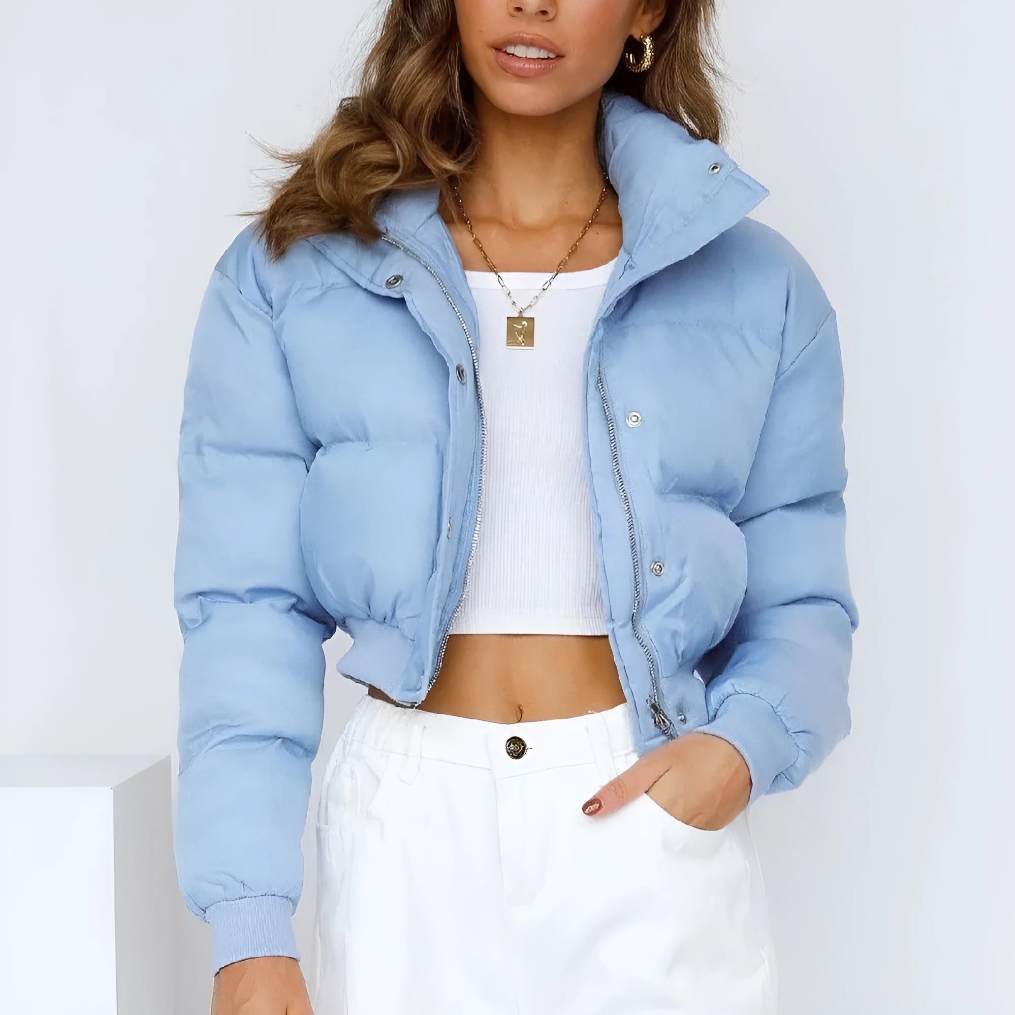 Women's loose fit long sleeve polyester jacket in blue colour on a hanger