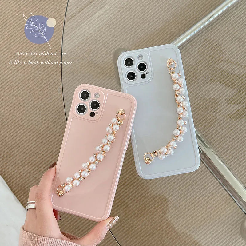 Silicone phone case with rhinestone pearl bracelet for iPhone Pro Max in pink and white options
