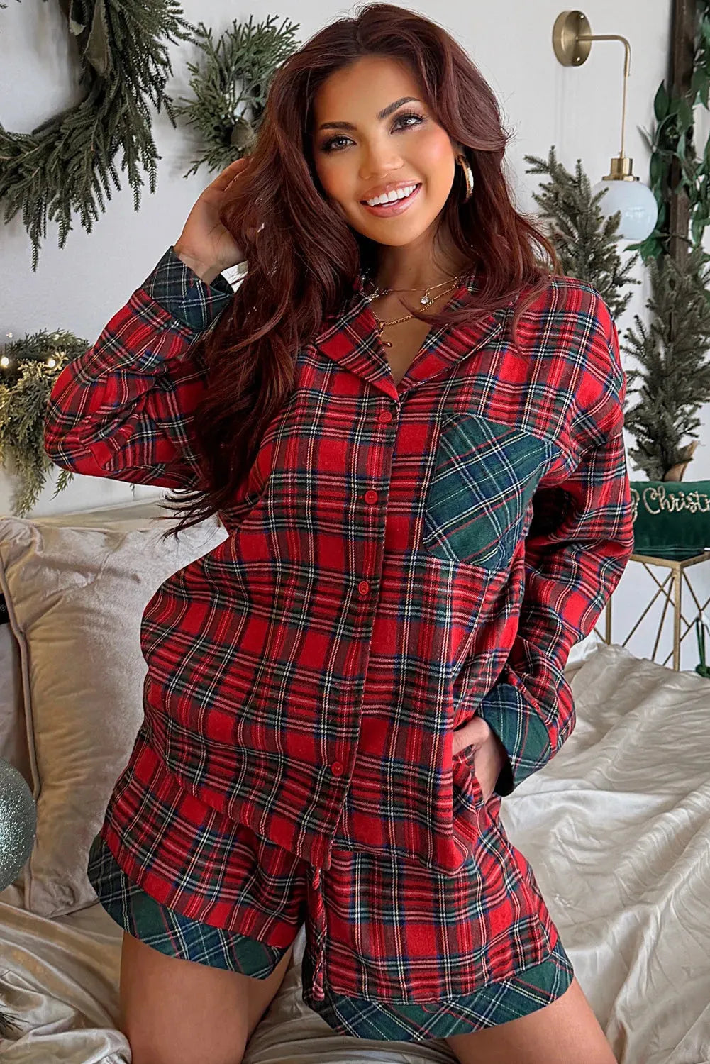 Red plaid Christmas pyjama set with contrast patches showing long sleeve shirt and shorts