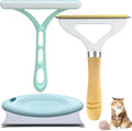 Three pet hair removal tools: a metal lint shaver, a double-row silicone brush, and a round ABS+TPR cleaner.