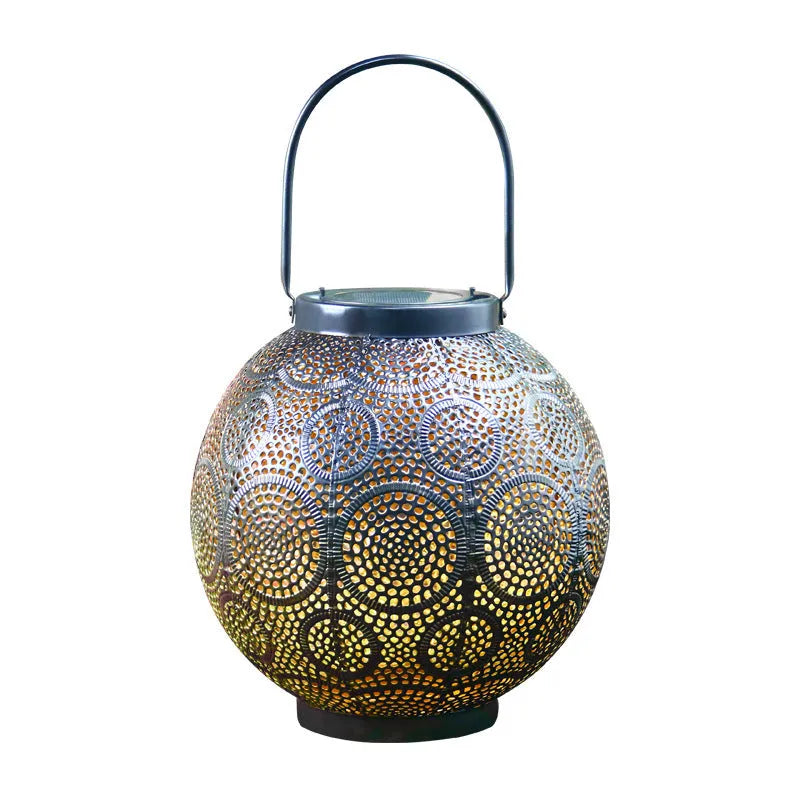Solar-powered decorative iron courtyard lamp with hollow design for outdoor garden use