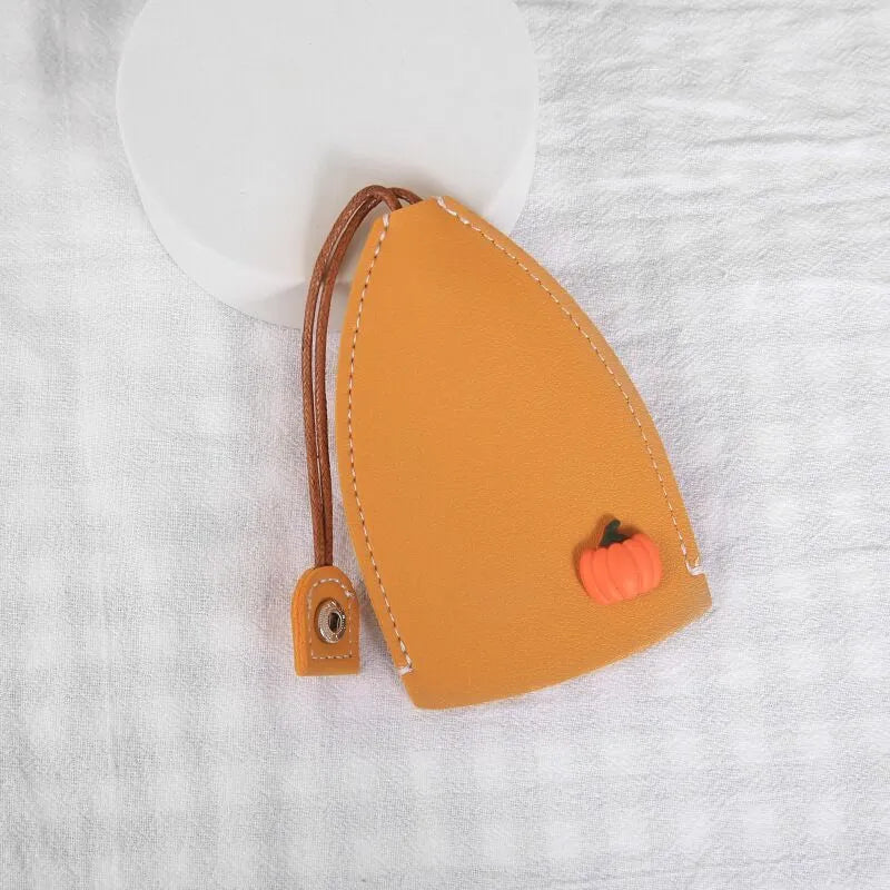 Cartoon style pull-out car key case made from PU leather in assorted designs