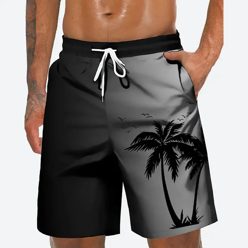 Man wearing loose grey polyester beach shorts on a sandy shore