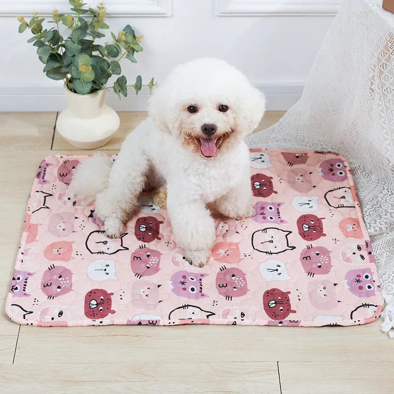 Reusable washable pet urine pad with colourful animal print design and waterproof backing.