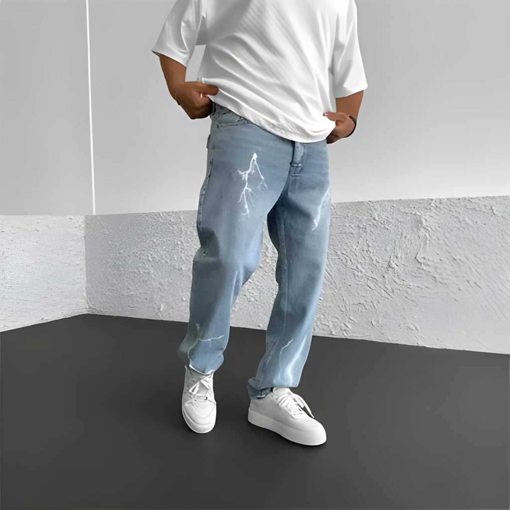 Blue men's straight-leg denim jeans with a loose wide-leg fit and mid-rise waist.