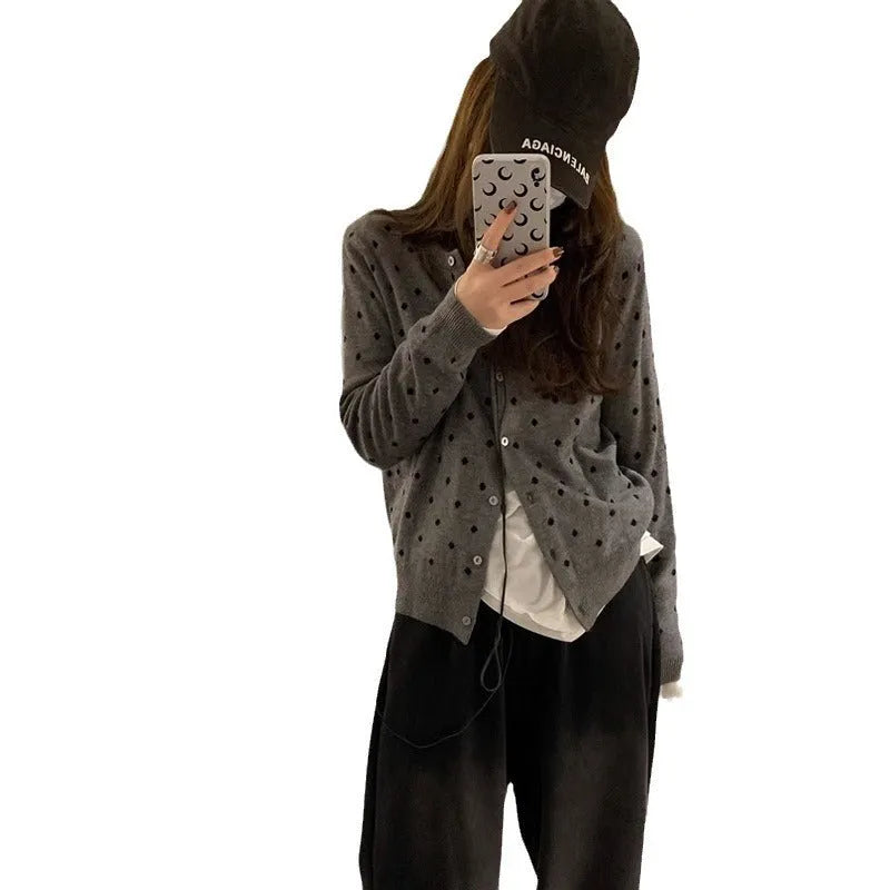 Women's gray dot knitted cardigan with crocheted flowers in black or gray.