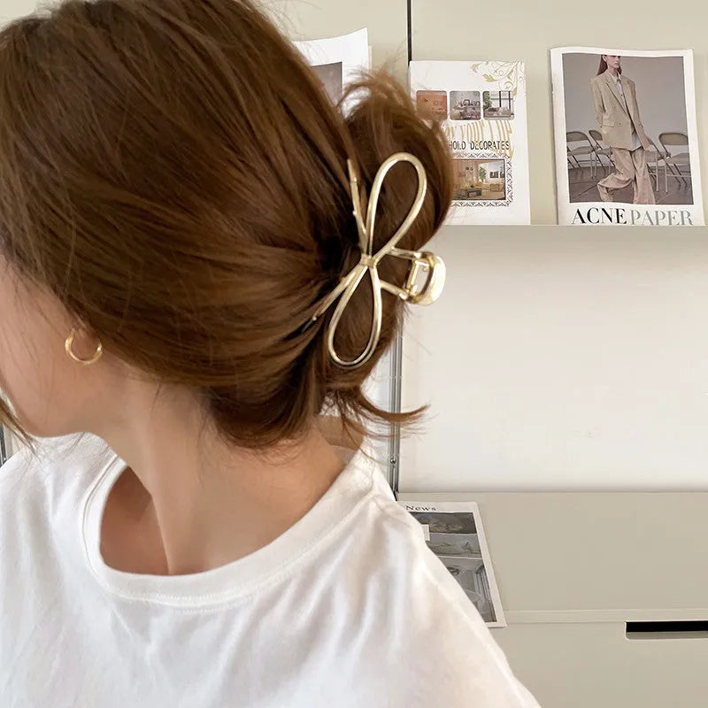 Women's bow barrette hair clip with back head grip in gold or silver alloy metal