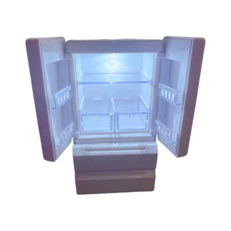 White plastic miniature candy toy model with light-up feature displayed on surface