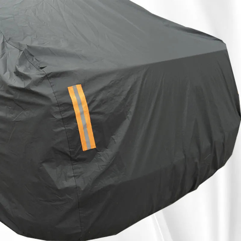 Grey Volkswagen car cover with PVC chemical fibre material shown in outdoor setting