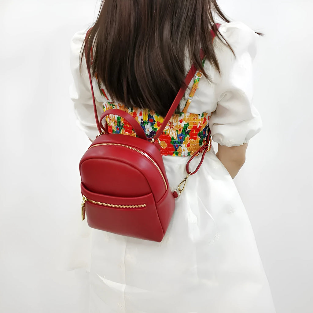 Soft PU mini backpack with three-dimensional pockets in street trend style showing contrast colour details