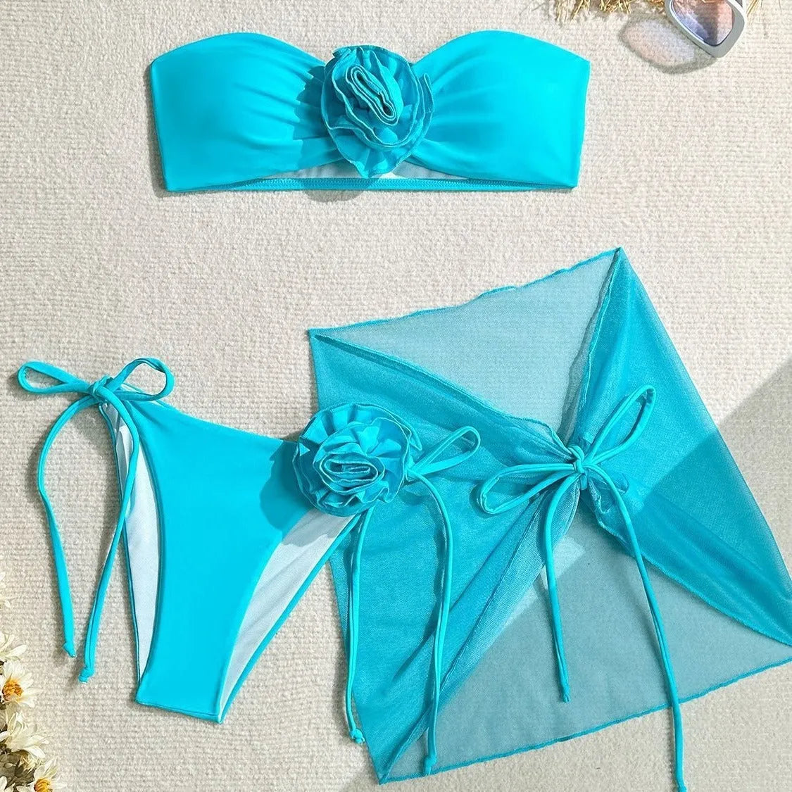Women's pink tube top swimsuit with three-dimensional flower tie and matching skirt set