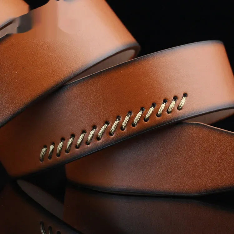 Men's retro styling pin buckle belt in black, brown, and white colour options showing pattern detailing