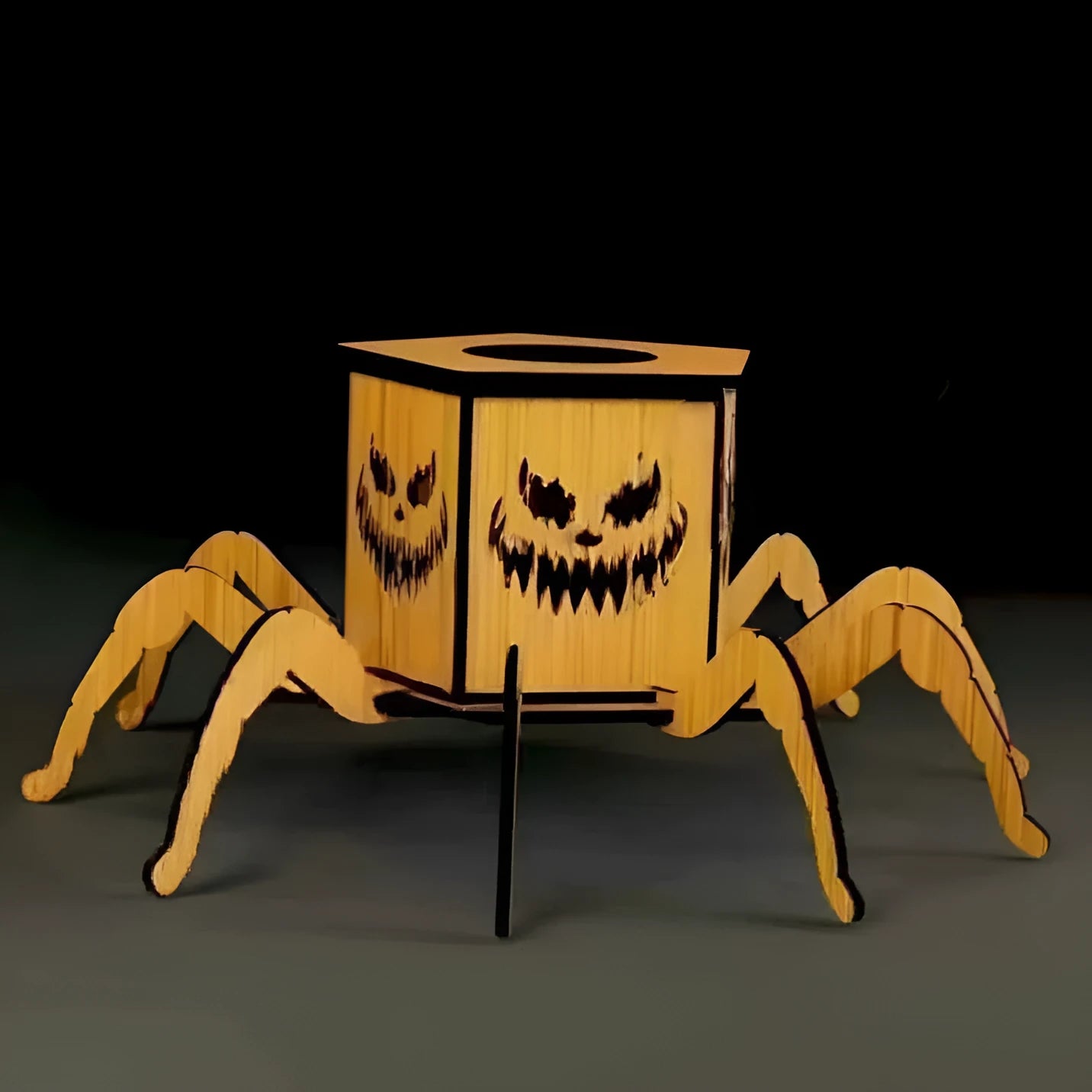 Wooden spider Halloween candlestick decoration measuring 21cm by 8.5cm