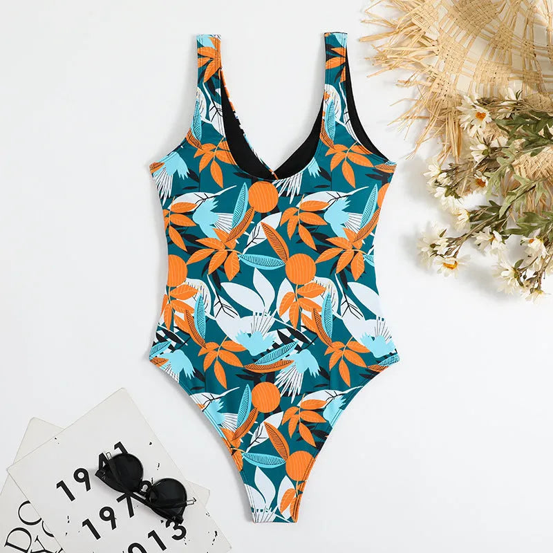 Women's high waist one-piece swimsuit in printed pattern, available in black or white.