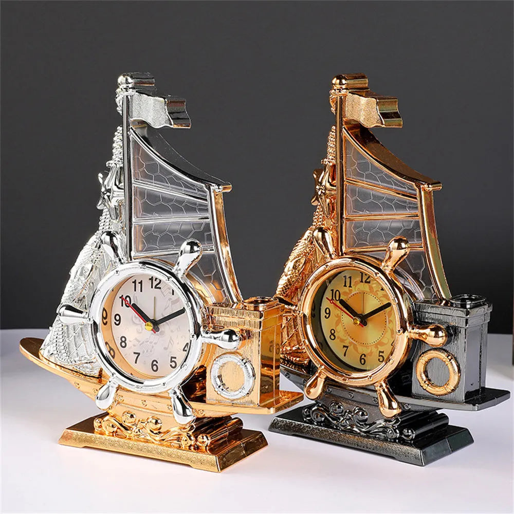 Fashion bedroom clock with gold or silver finish on plastic housing measuring 22.6cm wide