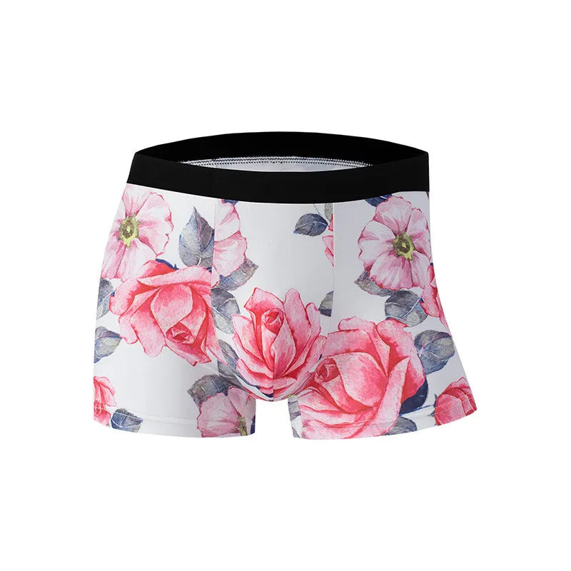 Men's ice silk printed underwear in polyester fabric showing floral design with mid waist cut