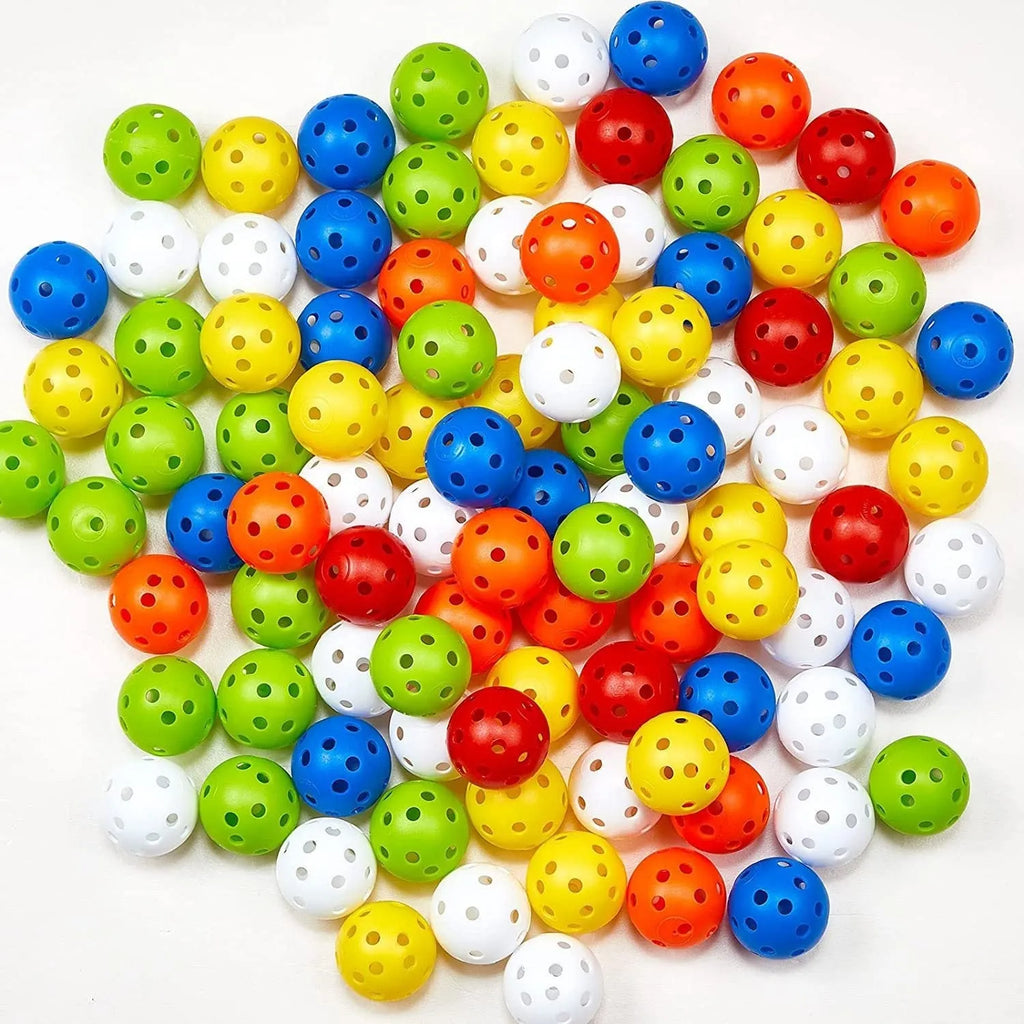 Multi-colour golf practice balls with 26-hole design including red, orange, blue, green, white and yellow