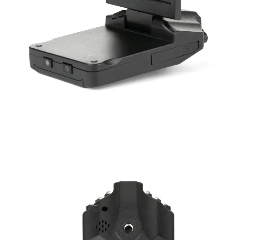 Black HD driving recorder with 120 degree wide angle lens mounted on car windscreen